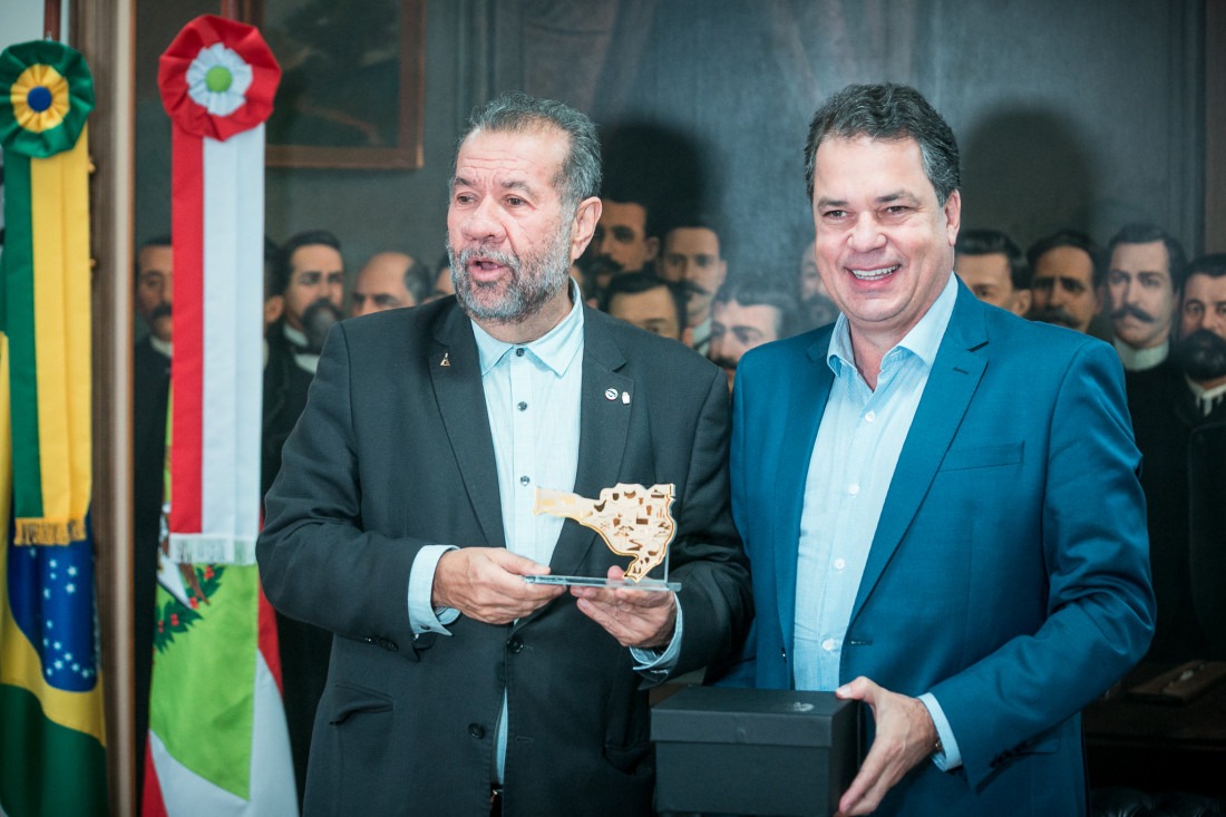 Ministro Carlos Lupi (esquerda) e deputado estadual Rodrigo Minotto (PDT) (direita)